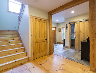 Stairs and entryway in rustic saltbox in Fayston, Vermont