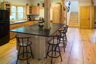 Custom kitchen in rustic saltbox in Fayston, Vermont
