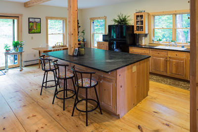 Kitchen island in rustic saltbox in Fayston, Vermont