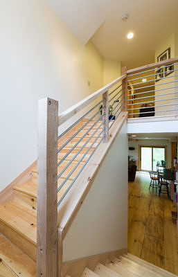 Custom stairway in rustic saltbox in Fayston, Vermont
