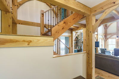 Staircase in timber frame home in Fayston, Vermont