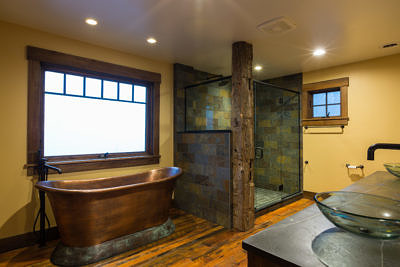 Custom bathroom in western style lodge home in Waterbury, Vermont
