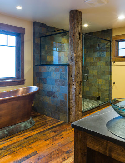 Custom bathroom in western style lodge home in Waterbury, Vermont