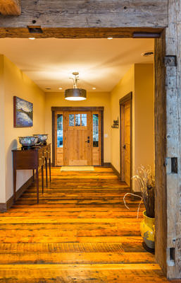 Entrance and hallway in western style lodge home in Waterbury, Vermont